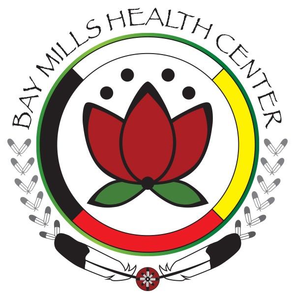 Bay Mills Health Center seal featuring a red lotus flower with green leaves centered in a circular ring with black, yellow, and red sections.